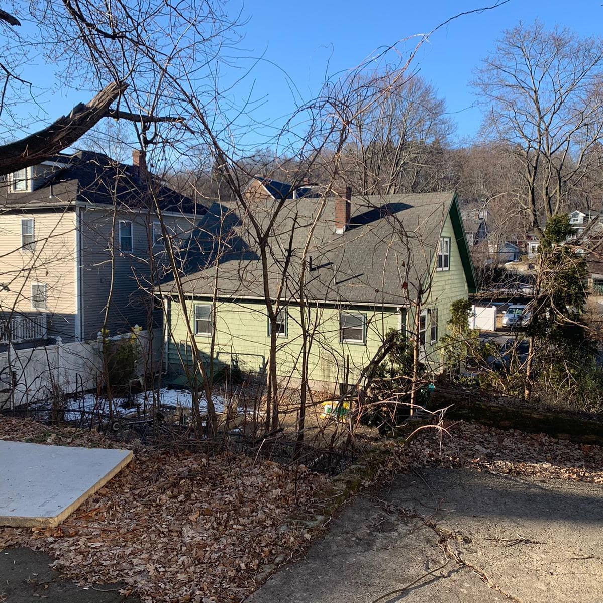 Branches and cut material around a house